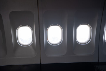 Airplane, aircraft window with white blank space.