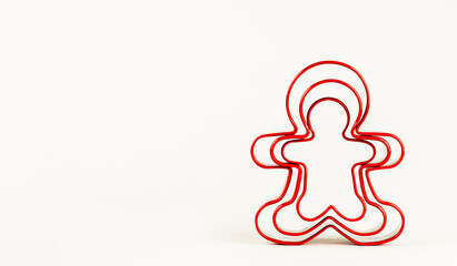Gingerbread man shape on white background. Concept of Christmas.