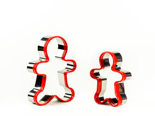 Gingerbread man shape on white background. Concept of Christmas.