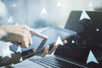 Creative abstract GPS locator sketch with world map and finger presses on a digital tablet on background, monitoring and tracking concept. Multi exposure