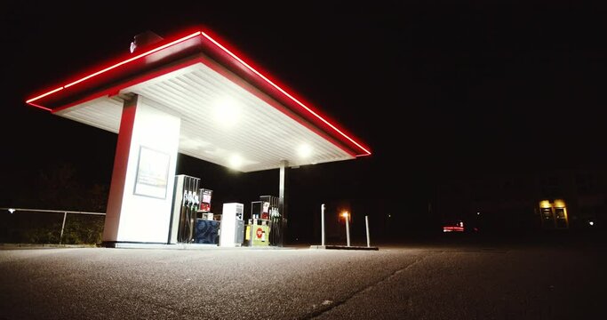 Illuminated Gas Station At Night