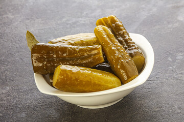 Marinated pickled cucumbers in the bowl