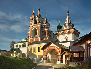 Fototapeta na wymiar Belfry, church of Transfiguration and refectory church of Icon of Our Lady of Kazan at Savvino-Storozhevsky monastery (Storozhi monastery of St. Savva). Zvenigorod. Russia