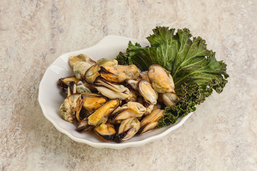 Tasty marinated mussels in the bowl
