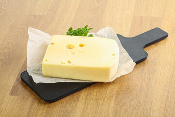 Maasdam cheese over the board