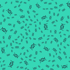 Black Wooden table with chair icon isolated seamless pattern on green background. Vector
