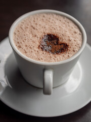Coffee latte heart art in white coffee cup