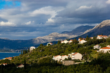 Fototapeta premium Mountains on the Adriatic coast. Settlements on the shore.
