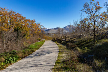 Fototapeta na wymiar Countryside road in Croatian mountains. Balkans.