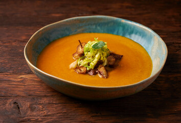 Carrot pumpkin soup with mushrooms