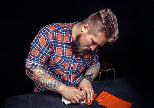 Leather Artisan works with leather