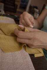 seamstress works at home in quarantine