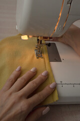 seamstress works at home in quarantine