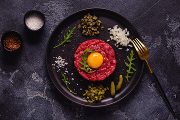 fresh beef tartar with tasty vegetables