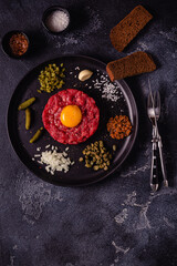 fresh beef tartar with tasty vegetables