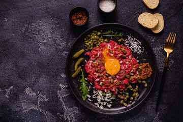 fresh beef tartar with tasty vegetables