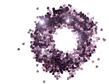  Circle Of Purple Sparkles On A White Background.