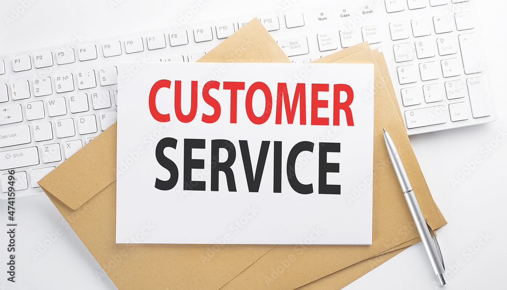 Poster text customer service on the envelope on the keyboard