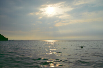 Sun at sea. variety of colors and hues of the rising sun. Sea landscape.