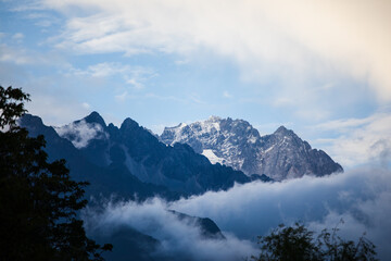 Jade Dragon Snow Mountain with clouds and blue sky near Lijiang in Yunnan province