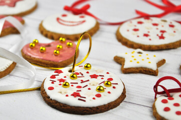 Colorful Icing cookies. Christmas homemade cookies on wooden table.