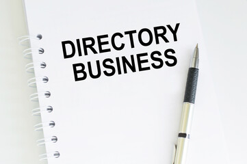 Notepad with text Directory Business near pen on a light desk, a business concept