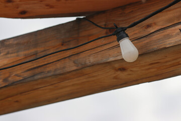 Lighting fixture on the gazebo of the building.