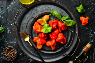 Hot bell peppers. Top view of chili peppers. Free space for text.