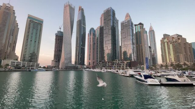 Dubai Marina canal at Jumeirah Beach  with Marina Walk Marina, Cayan Tower, Marina Gate Tower an more brand new buildings