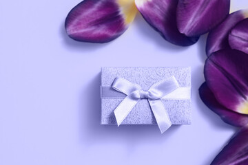 Trendy color of year 2022 Very Peri. Violet gift box on trendy color background. Trendy color background.