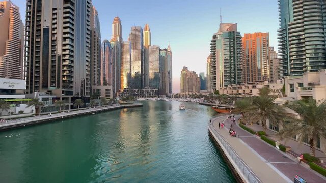 Dubai Marina canal at Jumeirah Beach  with Marina Walk Marina, Cayan Tower, Marina Gate Tower an more brand new buildings