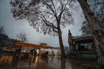 El Arenal de Bilbao getting dark and rainy on Christmas Eve