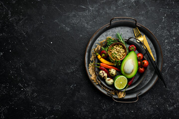 Spices, vegetables and herbs on a metal tray. Food background. Top view. Rustic style.