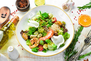 Seafood salad: mussels, shrimp, squid. Top view. Free space for text.