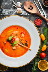 Tomato soup with seafood: shrimp and mussels. Top view. Free space for text.
