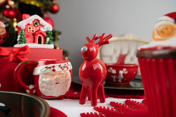Christmas background. Christmas tableware and decorations on the table.