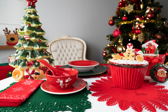 Christmas background. Christmas tableware and decorations on the table.