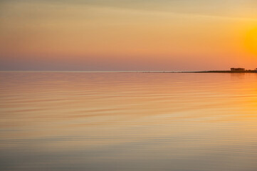 Beautiful sunset over Baltic sea. Natural background. Estonia. Afterglow, evening calm on the Sea.