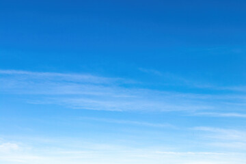 Blue sky with soft clouds for background