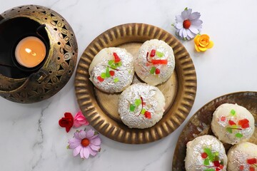 Rasmalai or Malai Sandwich, Roshmolai, Rasamalei is very popular Indian dessert. A sweet malai stuffing inside Rasgulla. It's a sweet delicacy made with Indian cottage cheese or chenna. Copy space.
