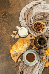 Coffee and croissant, good morning and breakfast concept
