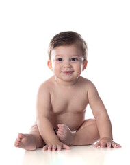 Cute baby in diaper looking at the camera