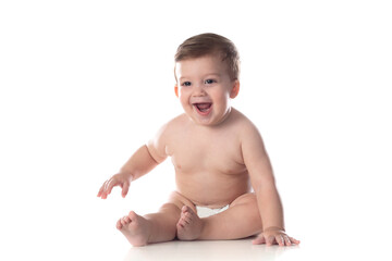 Cute baby in diaper looking at the camera - obrazy, fototapety, plakaty
