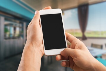 Covid pass certificate at airport. Digital gadget with a blank screen