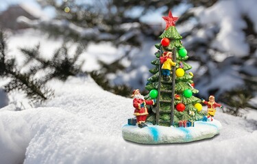 Beautiful christmas tree with gift boxes and ball