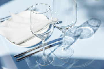 Elegant table setup in blue pastels for a wedding