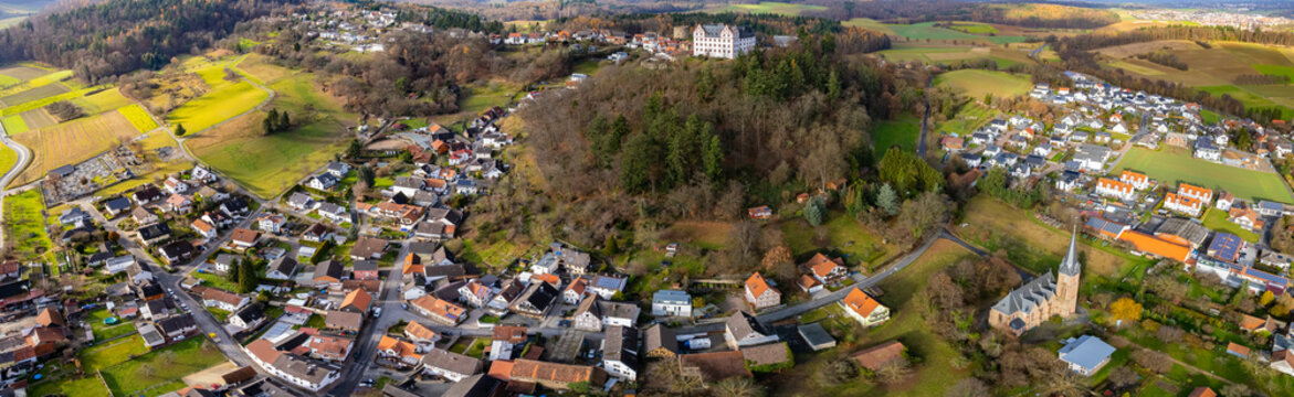  Aerial view of the city Niedernhausen, Fischbachtal in Germany. On an overcast day in Autumn.  