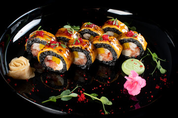 food sushi on the black plate