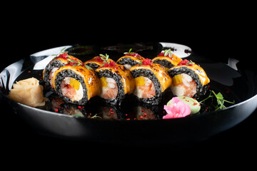 food sushi on the black plate