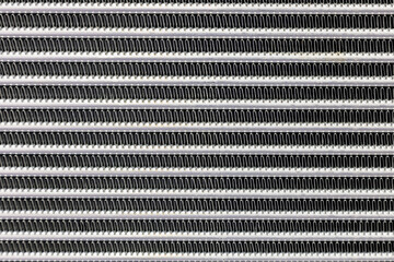 background of the radiator grille of a car or construction equipment